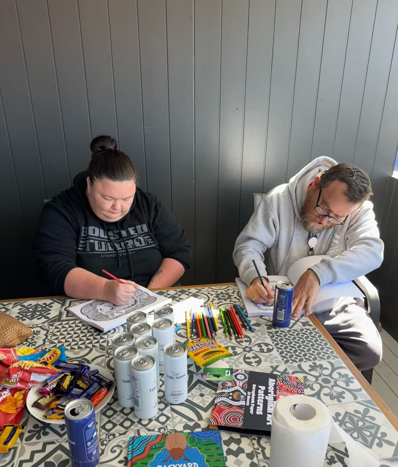 Participants taking part in a creative activity together